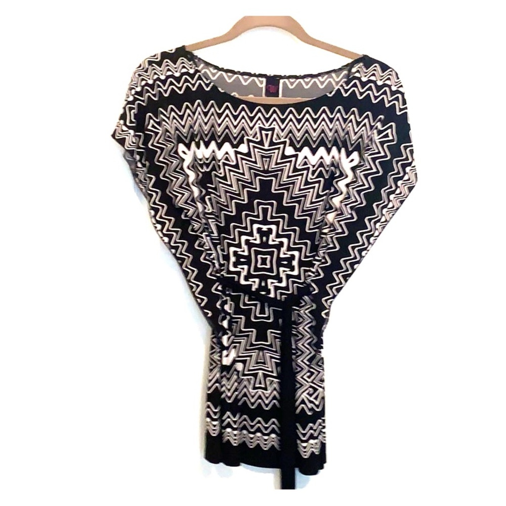Black and white print top with black wrap